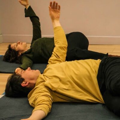Reaching into rolling on the back